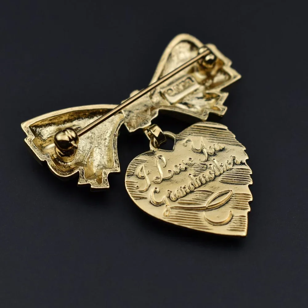 Small gold bow and heart brooch, elegant basic lapel pin